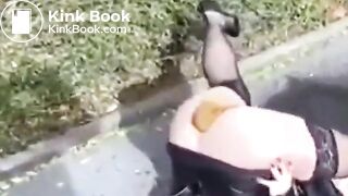 Poop and pee lying on her back at roadside