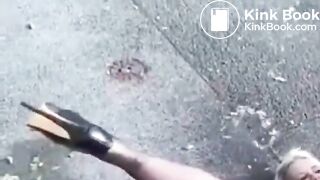 Poop and pee lying on her back at roadside