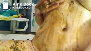 Mature woman smearing shit on her tits