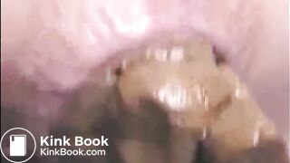 Girl shitting a very big turd closeup