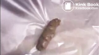 Girl shitting a very big turd closeup