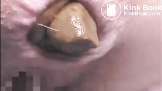 Girl shitting a very big turd closeup