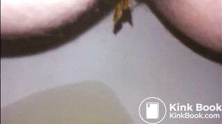 Hairy milf shitting in the toilet