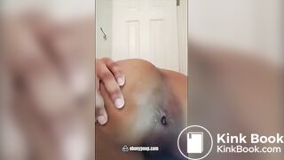 Black girl plays with turd
