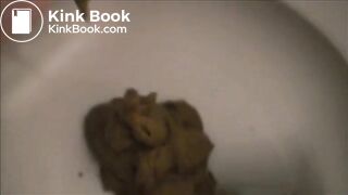 Girl shitting in the toilet closeup
