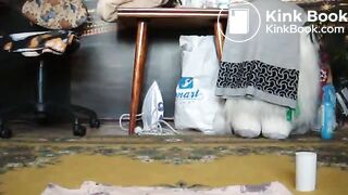 Slim brunette pushes out a meaty turd