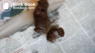 Slim brunette pushes out a meaty turd