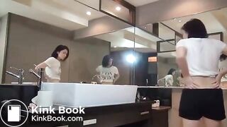 Japanese girl takes an enema and poops in sink