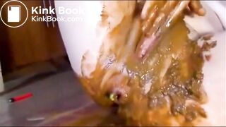 Girl masturbating and fisting her pussy with shit
