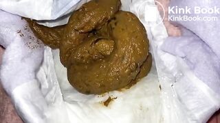 Big soft poo in open diaper