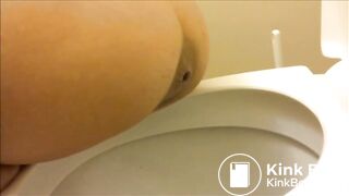 Woman in black pooping