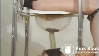Slave gets fed a shitty enema expulsion through a special toilet bowl