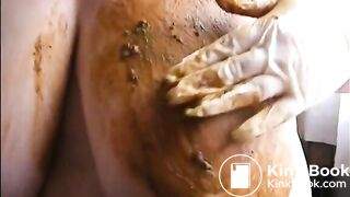 Mature bbw smearing shit on her huge tits