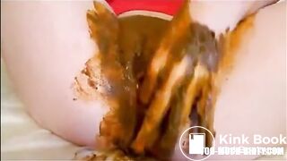 Girl masturbating pussy and ass while shitting