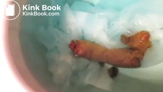 Pretty redhead poops into her clogged toilet