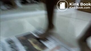 Naomi pooping on newspaper