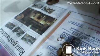 Naomi pooping on newspaper