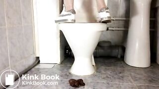 She shits next to the toilet