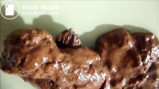 Nice view of a girl asshole while she is shitting a very big load