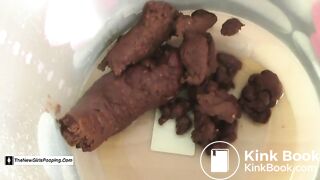 Pauline shits two days' worth of poop into a bucket