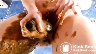 Girl shitting and masturbating with shitty dildo
