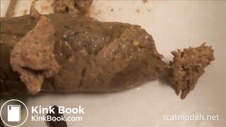 Tegan's anus expands to release a beautiful thick log