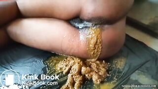 Creamy ebony poop smeared