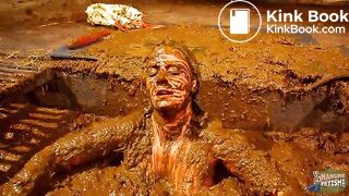 Betty has fun in the manure channel - bathing in cowshit