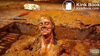 Betty has fun in the manure channel - bathing in cowshit