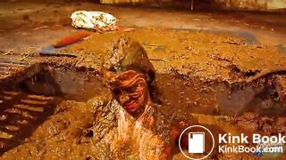 Betty has fun in the manure channel - bathing in cowshit