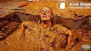 Betty has fun in the manure channel - bathing in cowshit