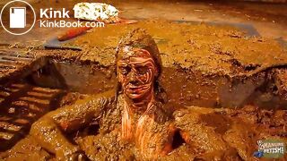 Betty has fun in the manure channel - bathing in cowshit