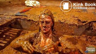 Betty has fun in the manure channel - bathing in cowshit