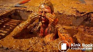 Betty has fun in the manure channel - bathing in cowshit