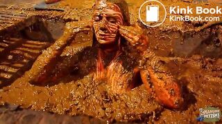 Betty has fun in the manure channel - bathing in cowshit