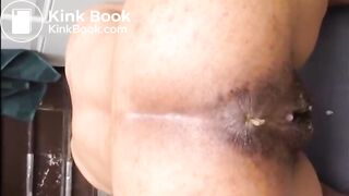 Hairy woman shitting doggystyle closeup