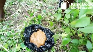 Poop in a black plastic bag