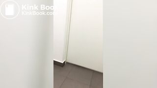 Big poop on the floor of a hospital toilet