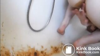 Young girl shitting a very liquid diarrhea in the bathtub -