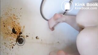 Young girl shitting a very liquid diarrhea in the bathtub -