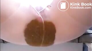 This woman shitting diarrhea on pantyhose