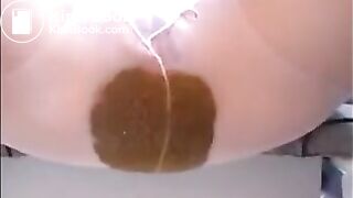 This woman shitting diarrhea on pantyhose