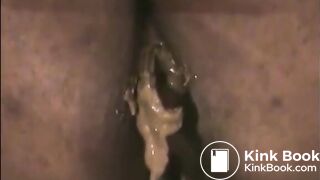 Ebony milf shitting diarrhea closeup