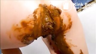 Dirty girl masturbating with a lot of shit and orgasm