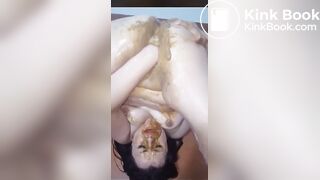 Shitting on her own face