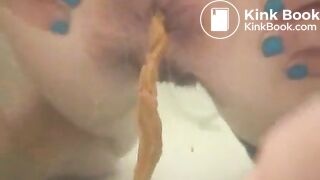 Woman shitting long diarrhea in the bathtub water