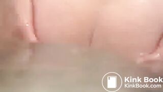 Woman shitting long diarrhea in the bathtub water