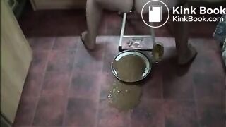 Wife shitting a lot of diarrhea in a white plate and pissing in a glass