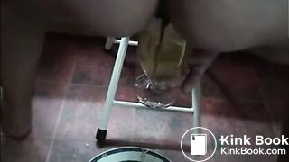 Wife shitting a lot of diarrhea in a white plate and pissing in a glass