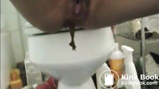Girl shitting dildo and long poo
